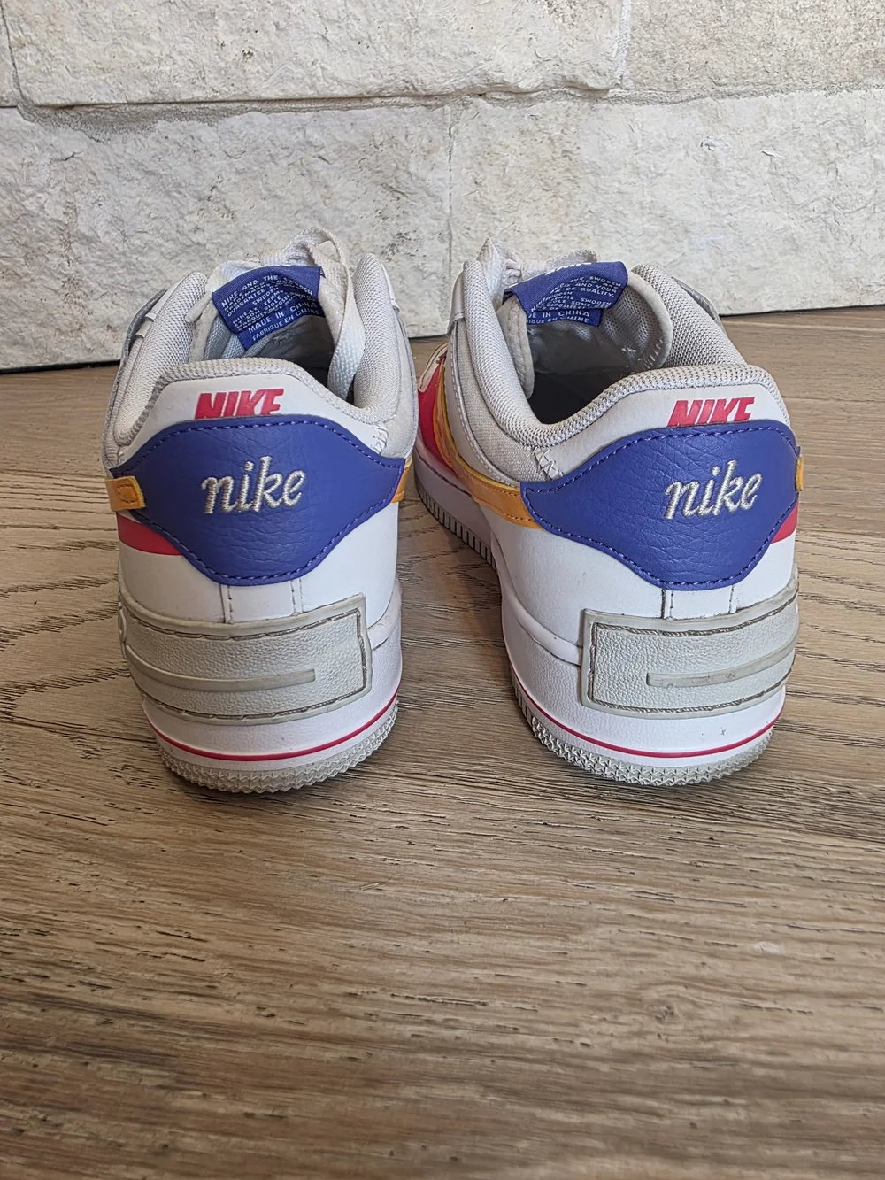 Nike Womens White Sneakers with Yellow & Pink & Purple Accents